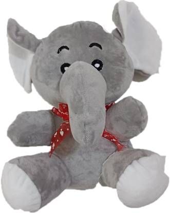 Elephant soft toy red ribbon tie